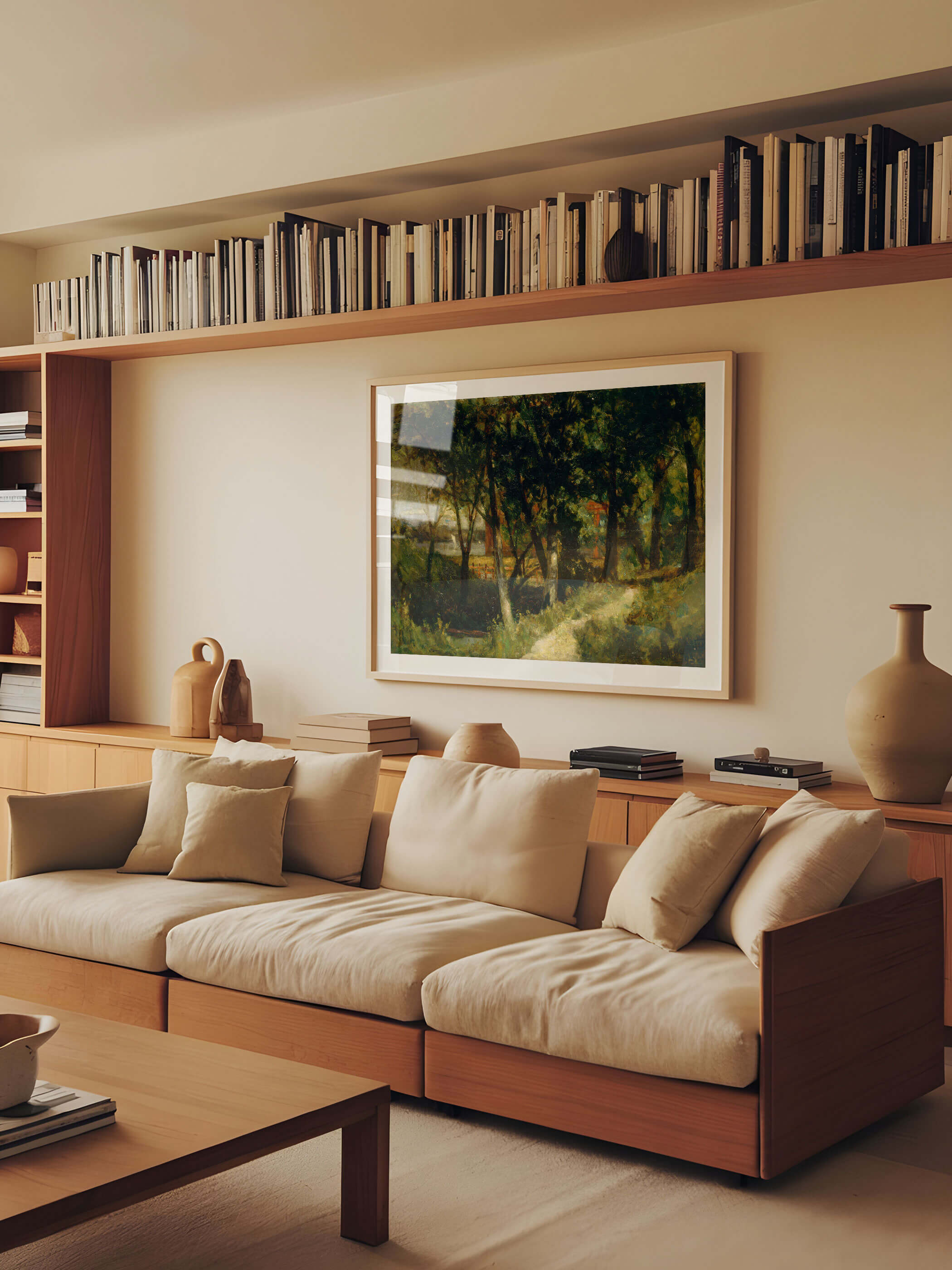 Vintage-Waldlandschaft Kunstdruck von Edward Mitchell Bannister in einem modernen Wohnzimmer mit einem Bücherregal, das über das Sofa reicht. Harmoniert perfekt mit neutralen Tönen und natürlicher Beleuchtung.