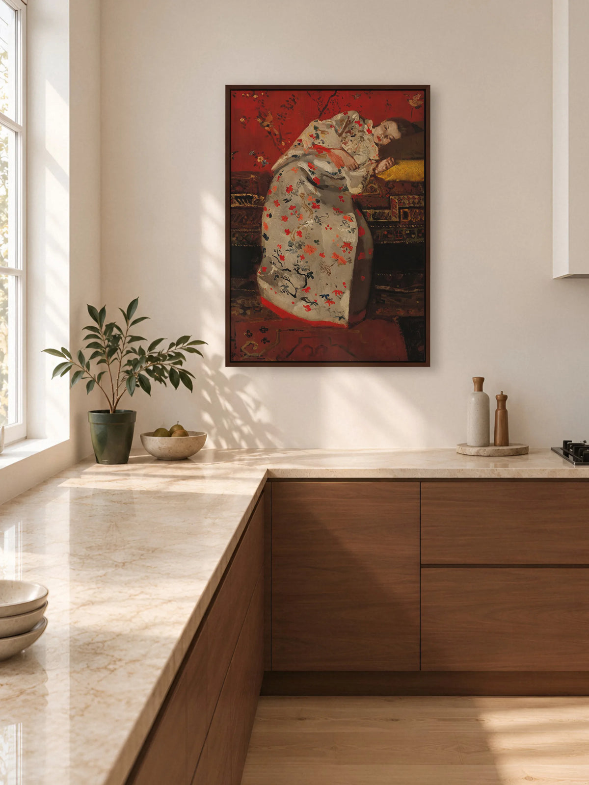 Leinwandbild mit Mädchen im Kimono im braunen Rahmen in einer hellen Küche über einer Arbeitsplatte aus Marmor mit Fronten aus Nussbaum
